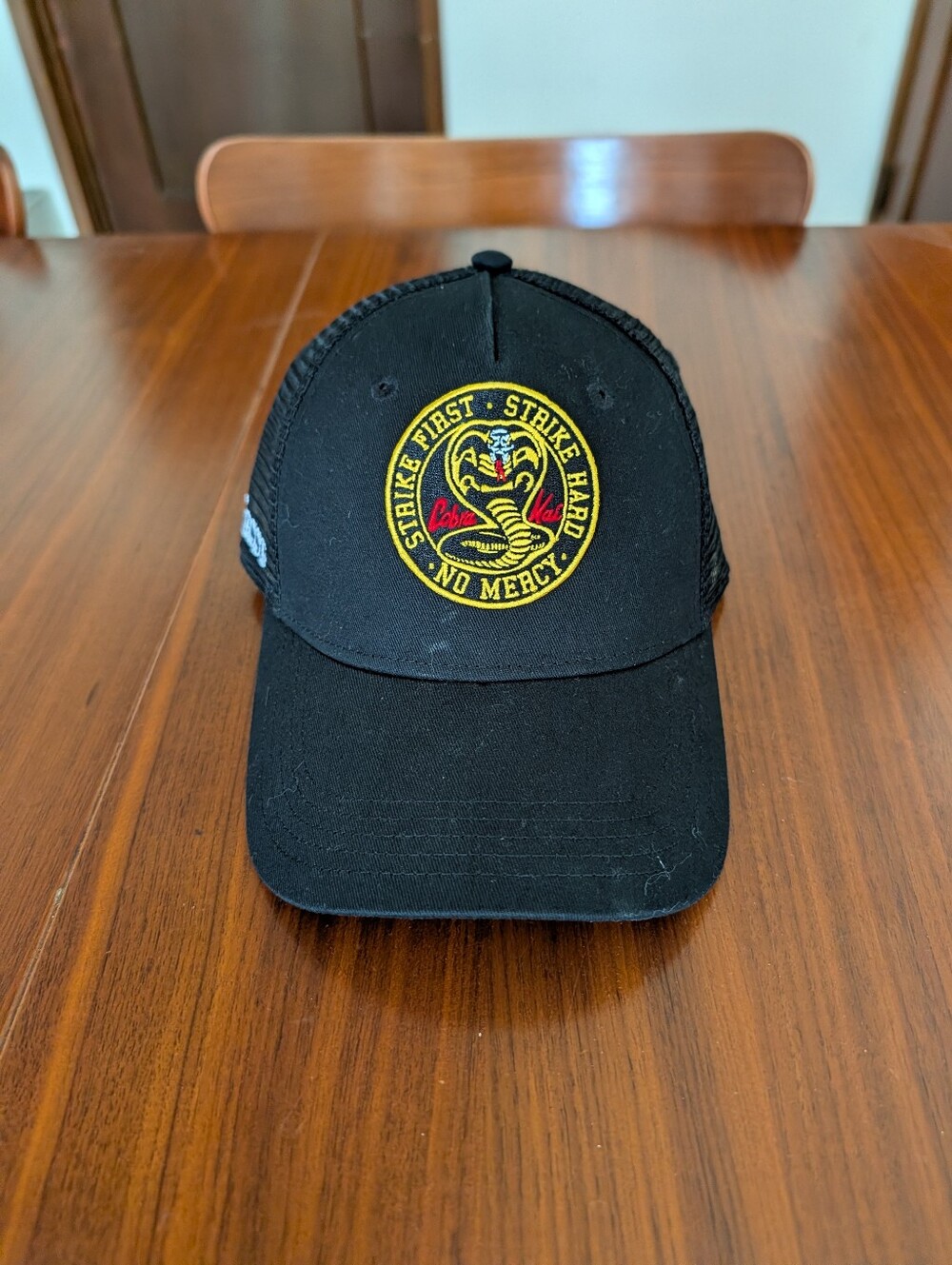 Ellesse X Cobra Kai Lonza Trucker Cap Black Snapback Hat Strike First No Mercy